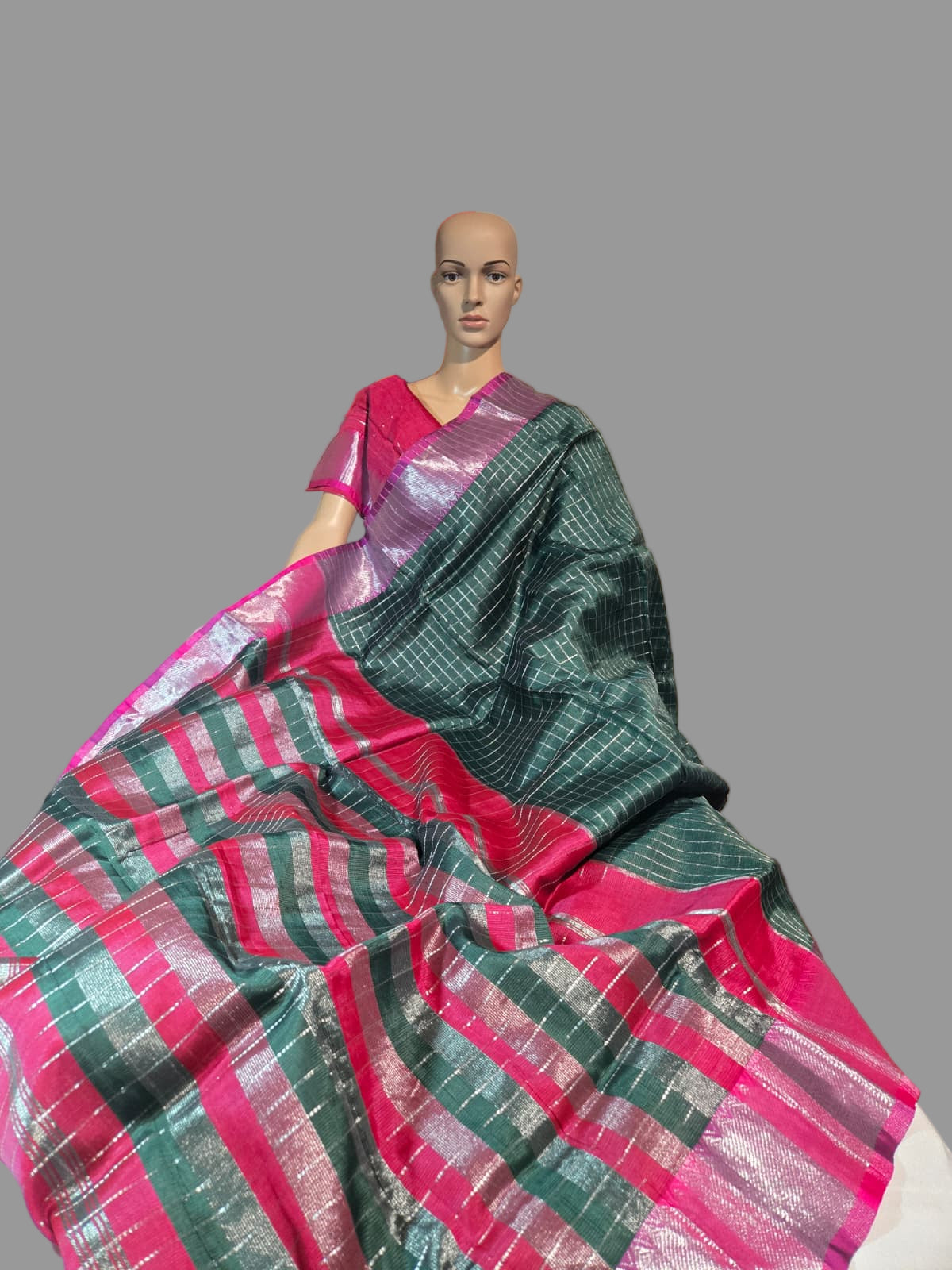Semi Mangalgiri Silk Check Saree features an elegant allover silver zari checked pattern Bottle Green