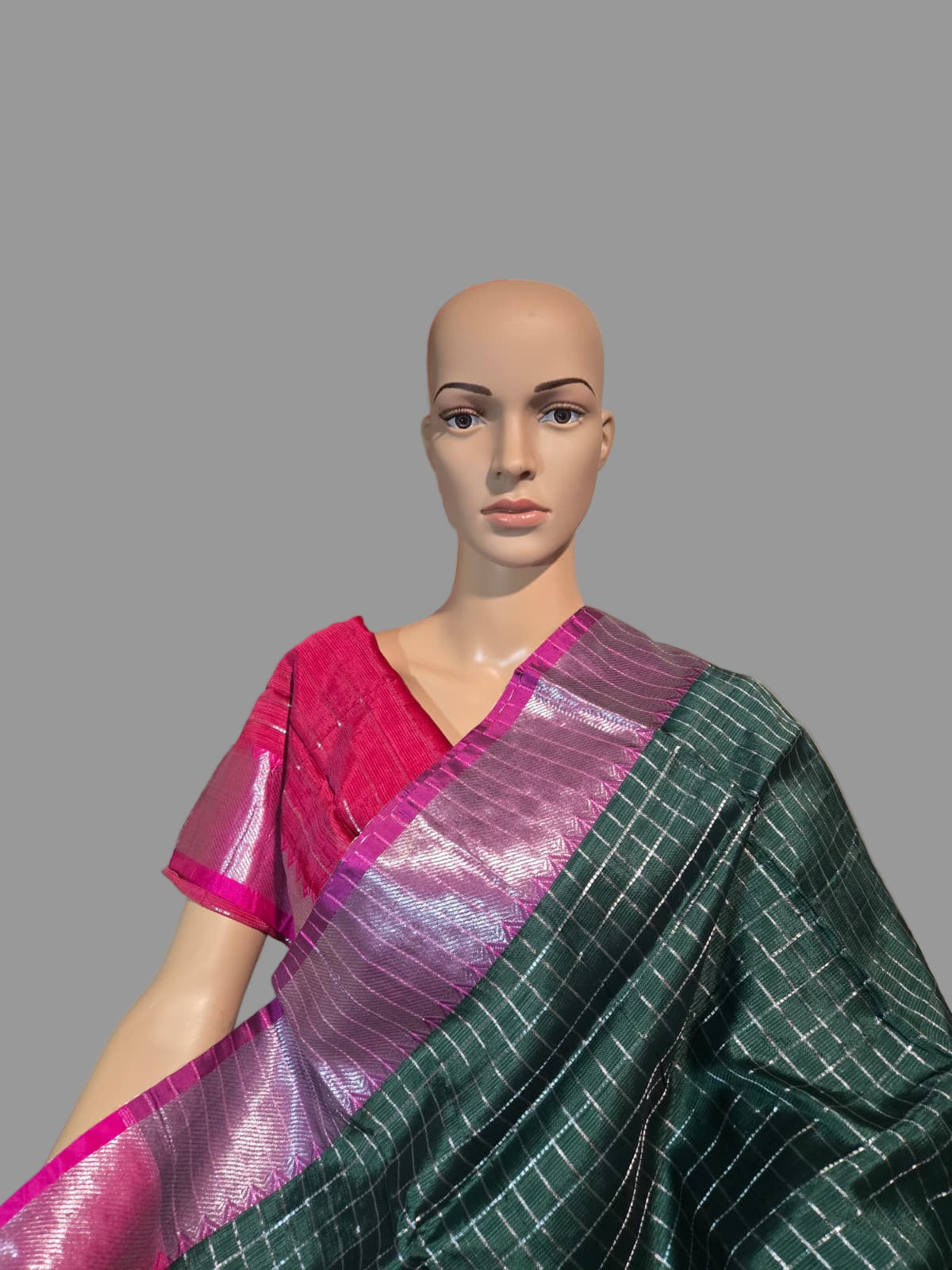Semi Mangalgiri Silk Check Saree features an elegant allover silver zari checked pattern Bottle Green