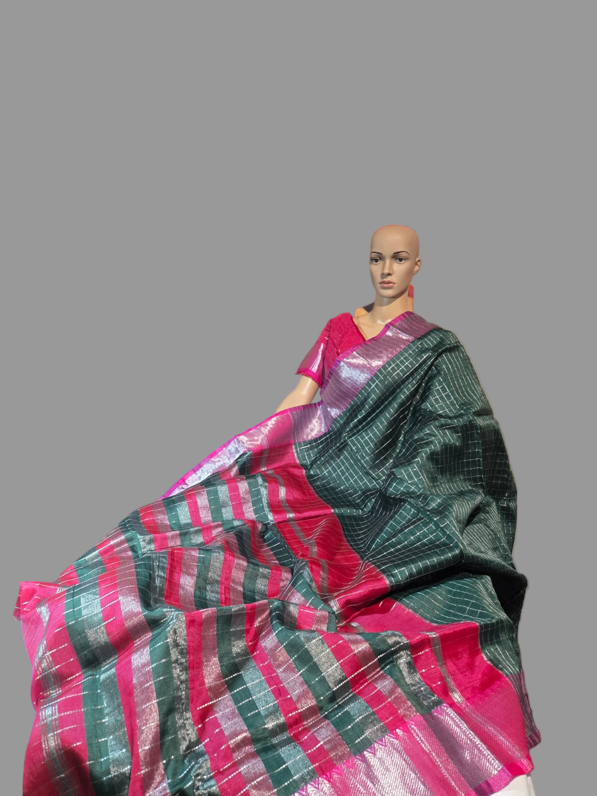 Semi Mangalgiri Silk Check Saree features an elegant allover silver zari checked pattern Bottle Green