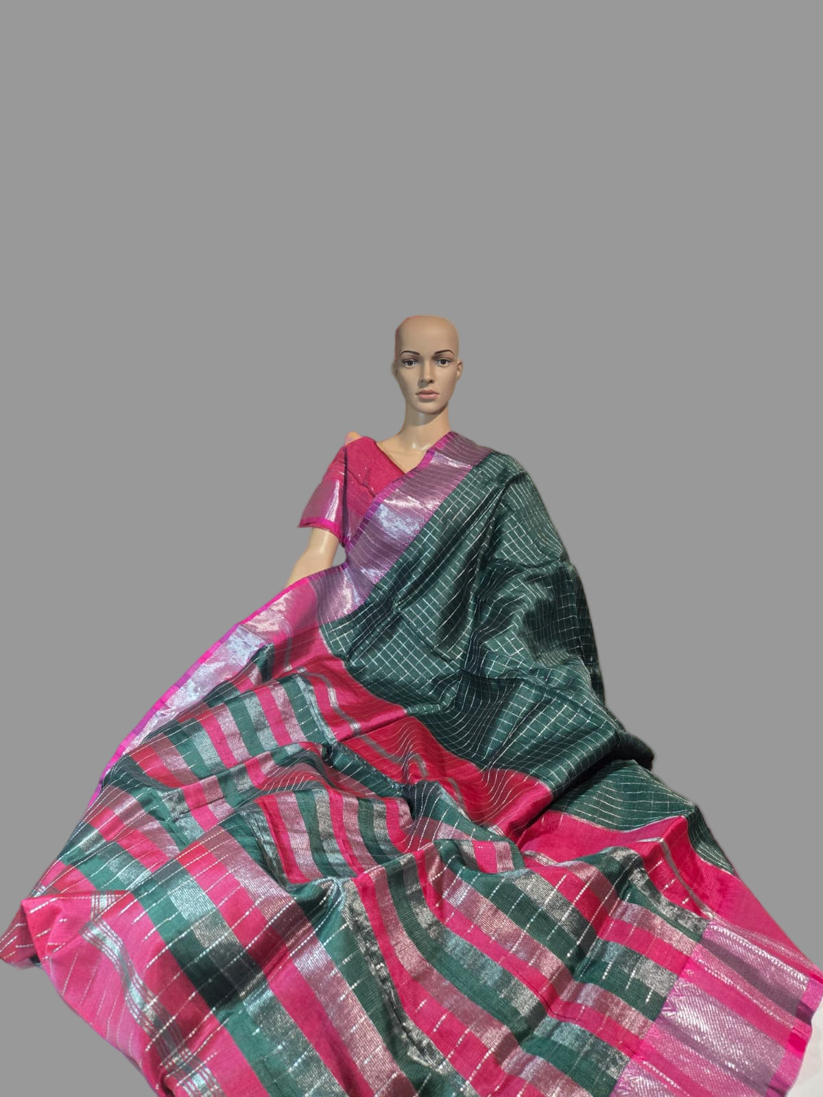 Semi Mangalgiri Silk Check Saree features an elegant allover silver zari checked pattern Bottle Green