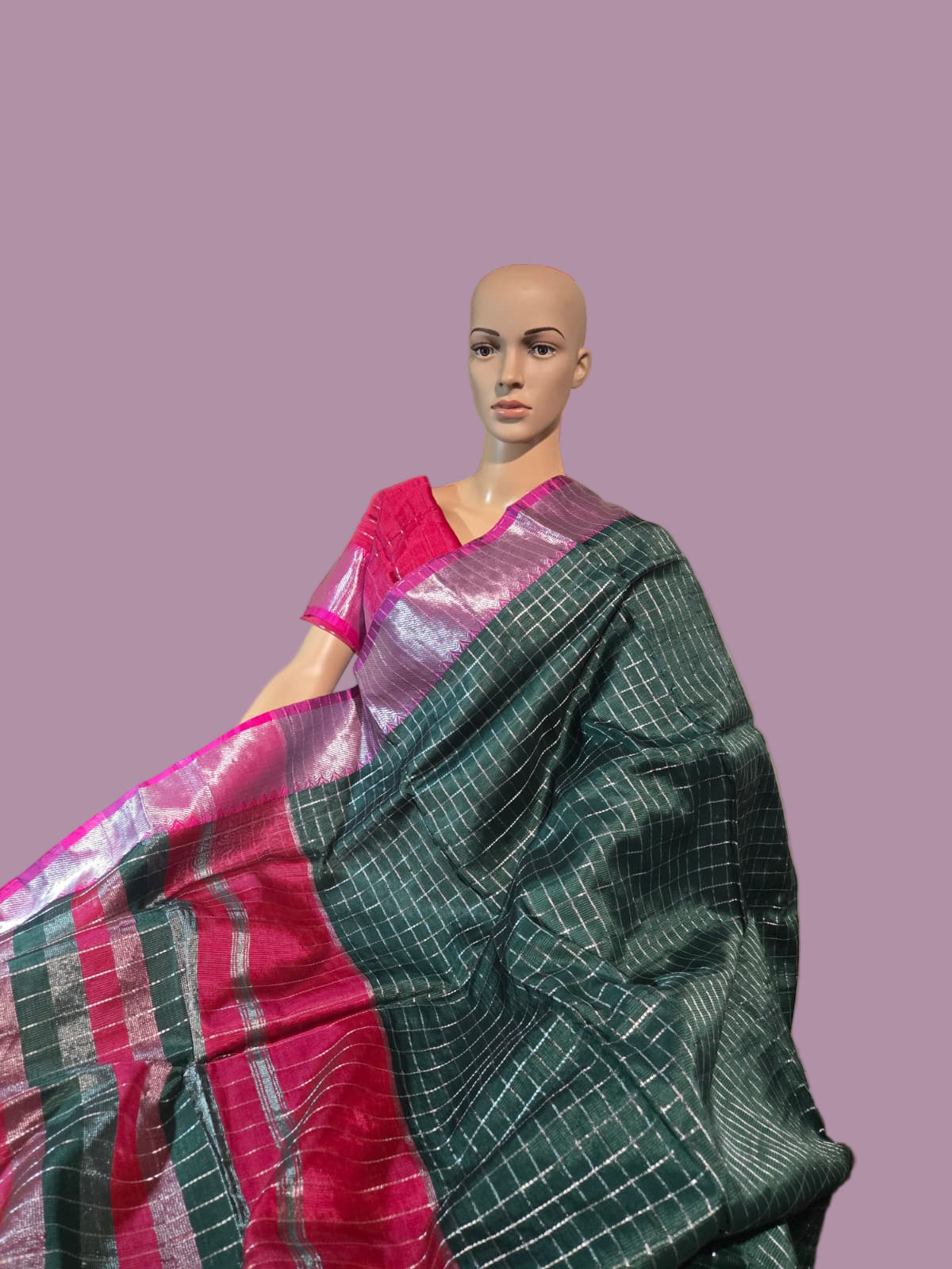 Semi Mangalgiri Silk Check Saree features an elegant allover silver zari checked pattern Bottle Green