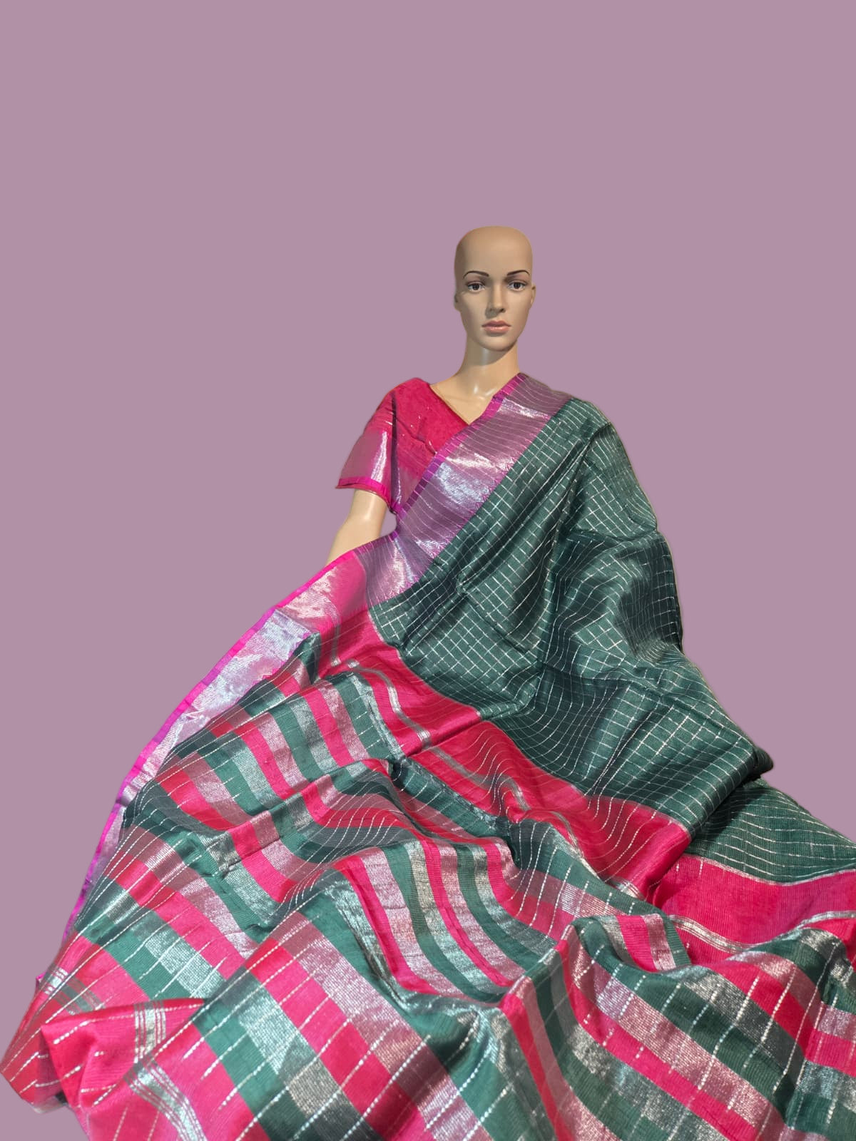 Semi Mangalgiri Silk Check Saree features an elegant allover silver zari checked pattern Bottle Green