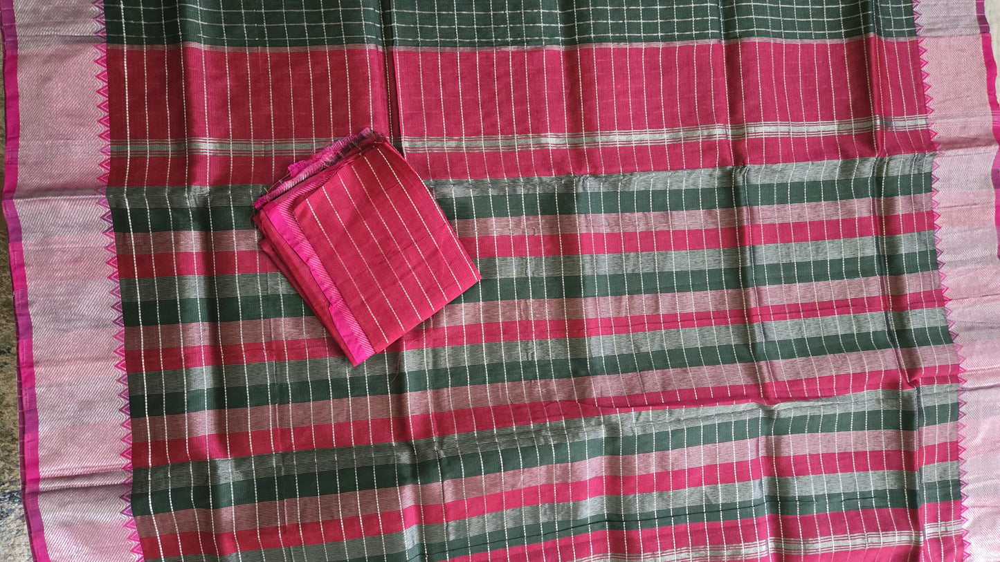 Bottle green and dark pink semi-pattu silk saree, beautifully adorned with an allover silver zari checked pattern and a graceful silver zari-woven border.