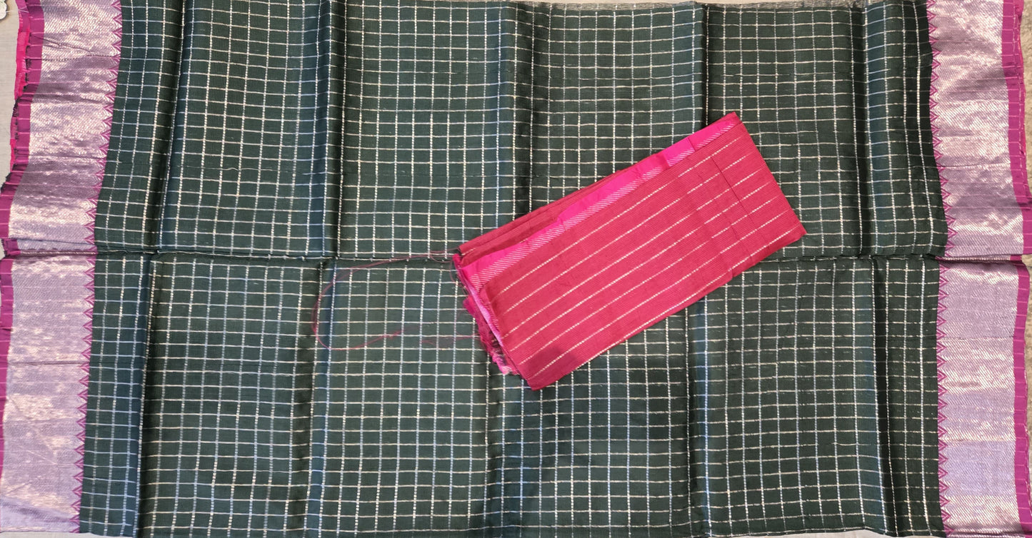 Bottle green and dark pink semi-pattu silk saree, beautifully adorned with an allover silver zari checked pattern and a graceful silver zari-woven border.