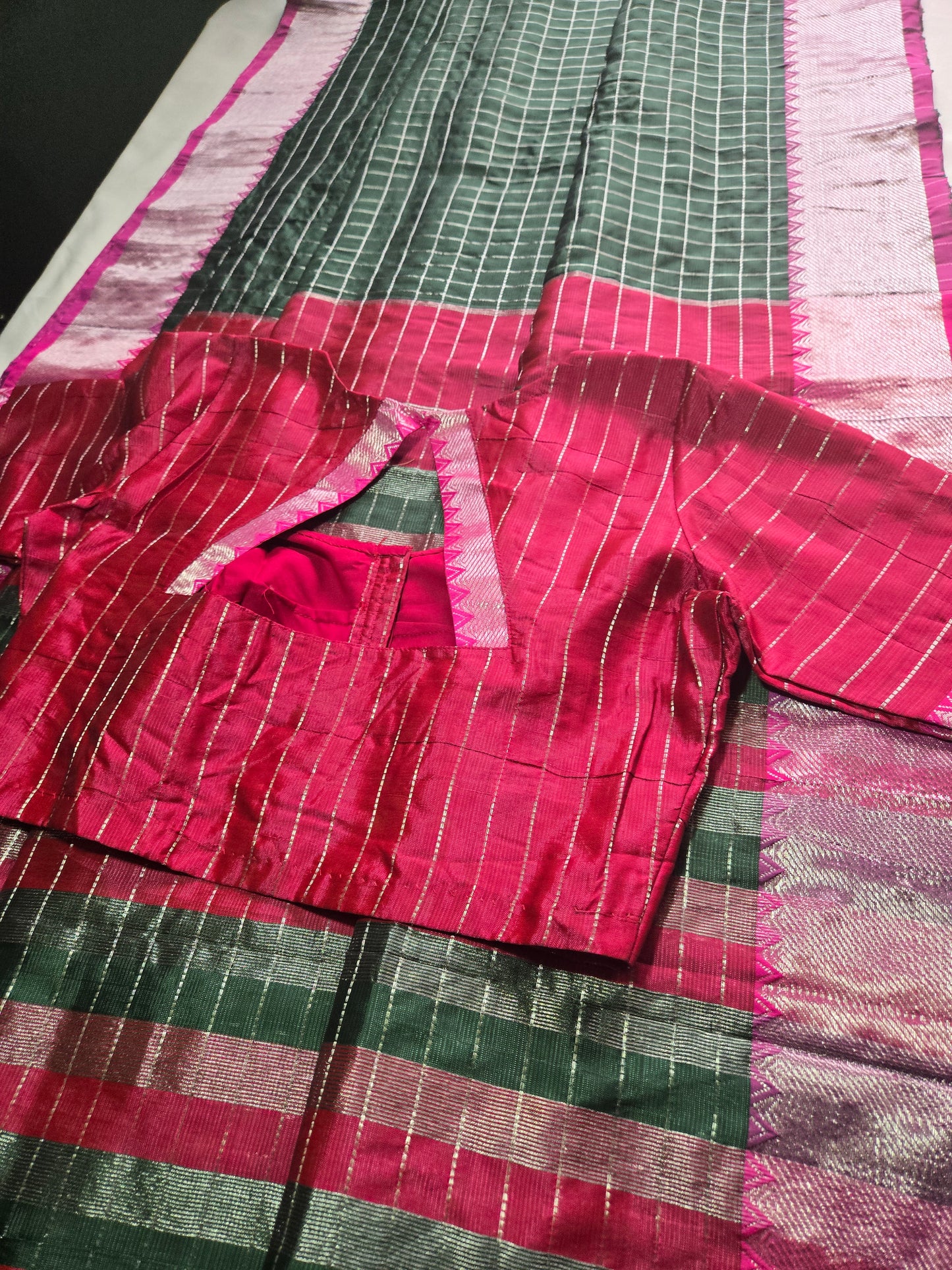 Semi Mangalgiri Silk Check Saree features an elegant allover silver zari checked pattern Bottle Green (Copy)