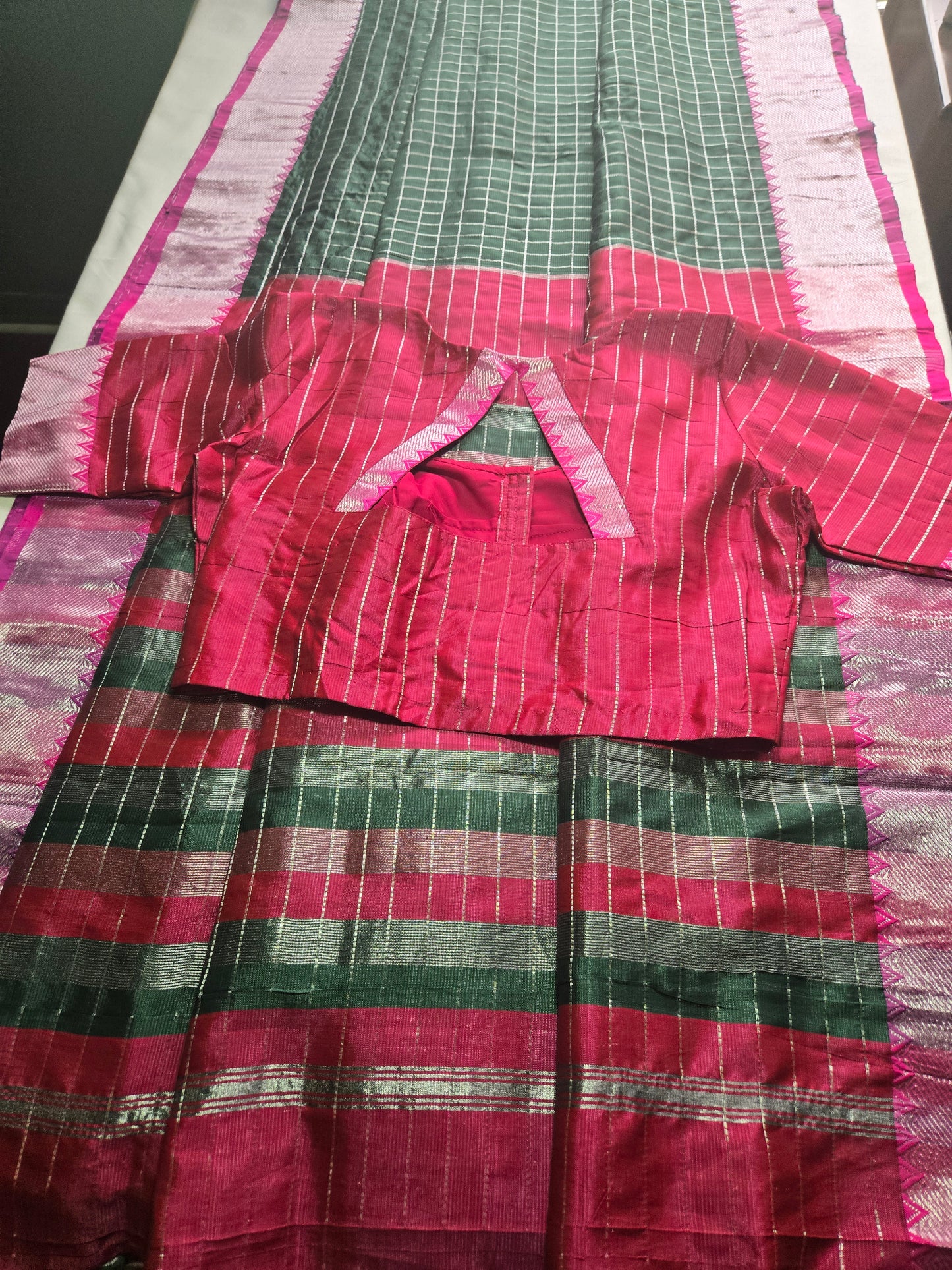 Semi Mangalgiri Silk Check Saree features an elegant allover silver zari checked pattern Bottle Green (Copy)