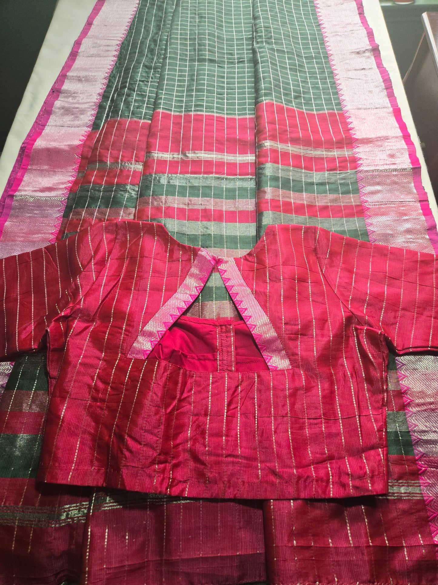 Semi Mangalgiri Silk Check Saree features an elegant allover silver zari checked pattern Bottle Green (Copy)