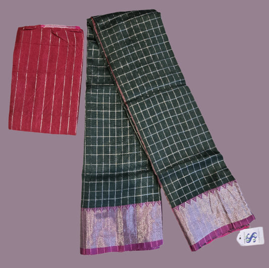 Bottle green and dark pink semi-pattu silk saree, beautifully adorned with an allover silver zari checked pattern and a graceful silver zari-woven border.