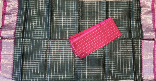 Bottle green and dark pink semi-pattu silk saree, beautifully adorned with an allover silver zari checked pattern and a graceful silver zari-woven border.